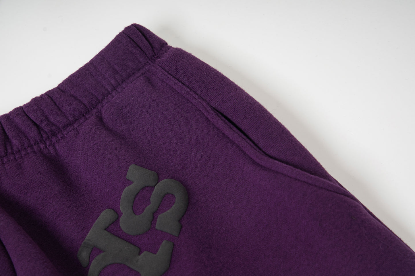SP5DER-PURPLE-LOGO-PANTS