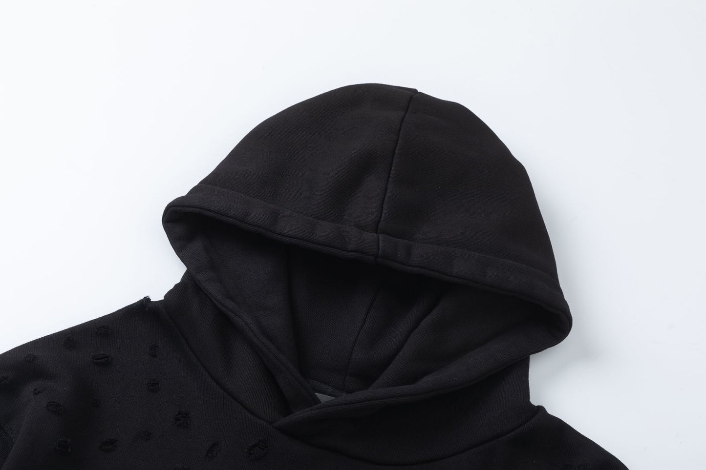 AMIRI-HOLLYWOOD-HOLES-HOODIE