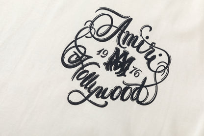 AMIRI-ITALICS-HOLLYWOOD-T-SHIRT