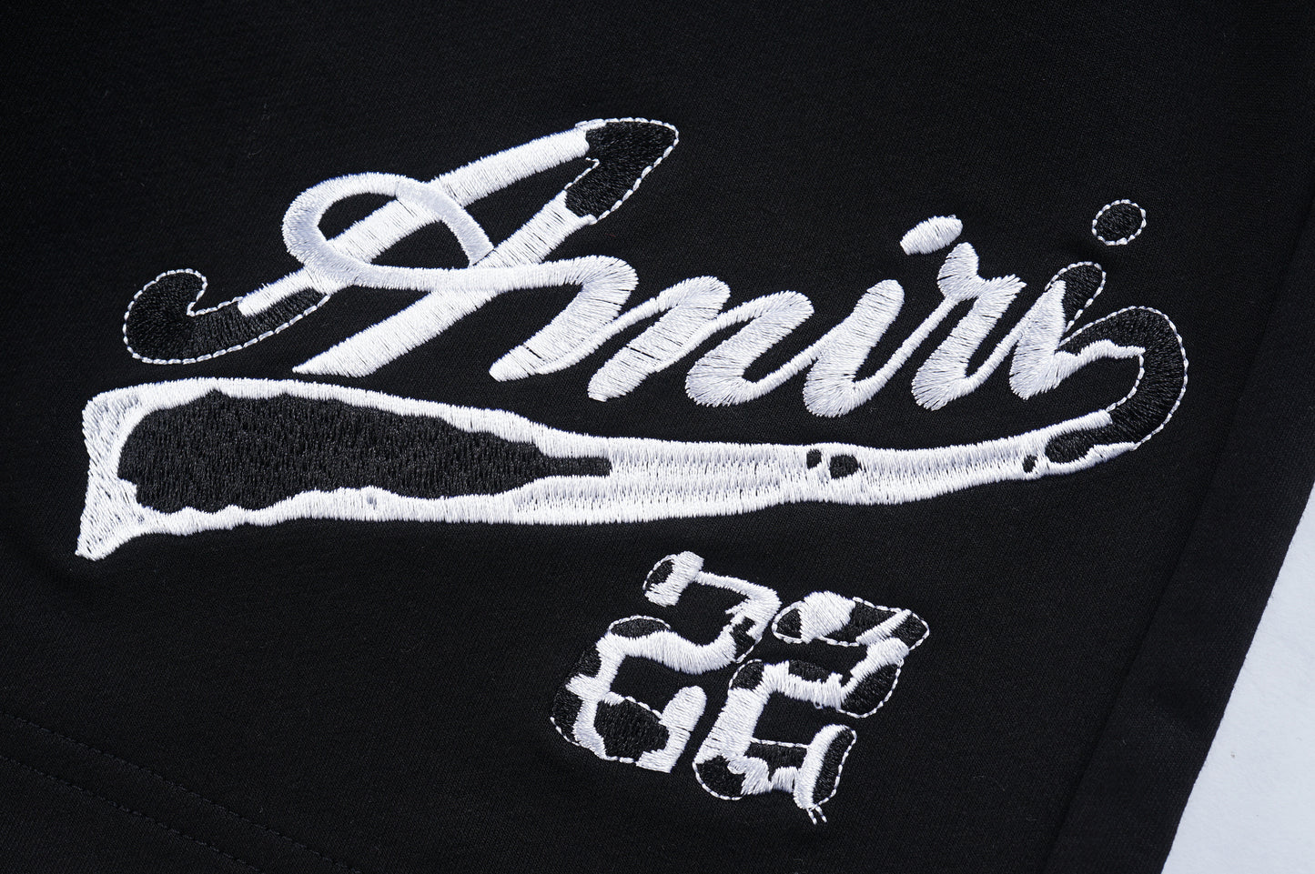 AMIRI-BLACK-ITALICS-22-SHORT