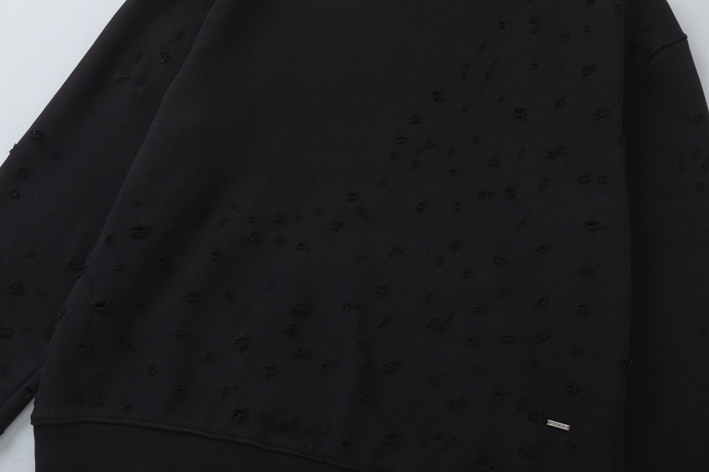 AMIRI-HOLLYWOOD-HOLES-HOODIE