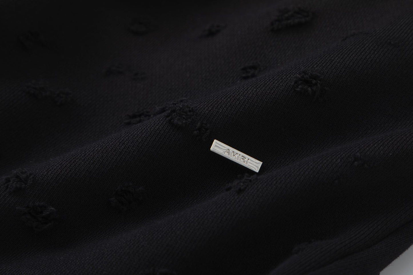 AMIRI-HOLLYWOOD-HOLES-HOODIE