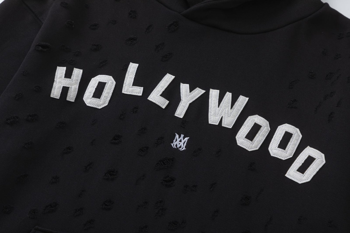 AMIRI-HOLLYWOOD-HOLES-HOODIE