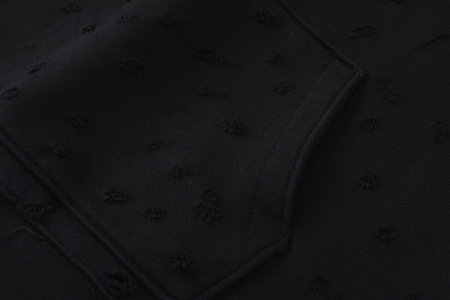 AMIRI-HOLLYWOOD-HOLES-HOODIE