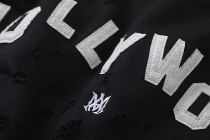 AMIRI-HOLLYWOOD-HOLES-HOODIE