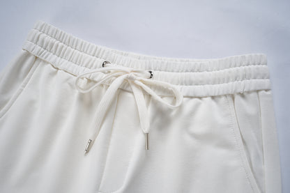 AMIRI-WHITE-ITALICS-22-SHORT