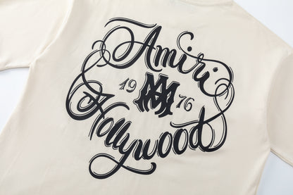 AMIRI-ITALICS-HOLLYWOOD-T-SHIRT
