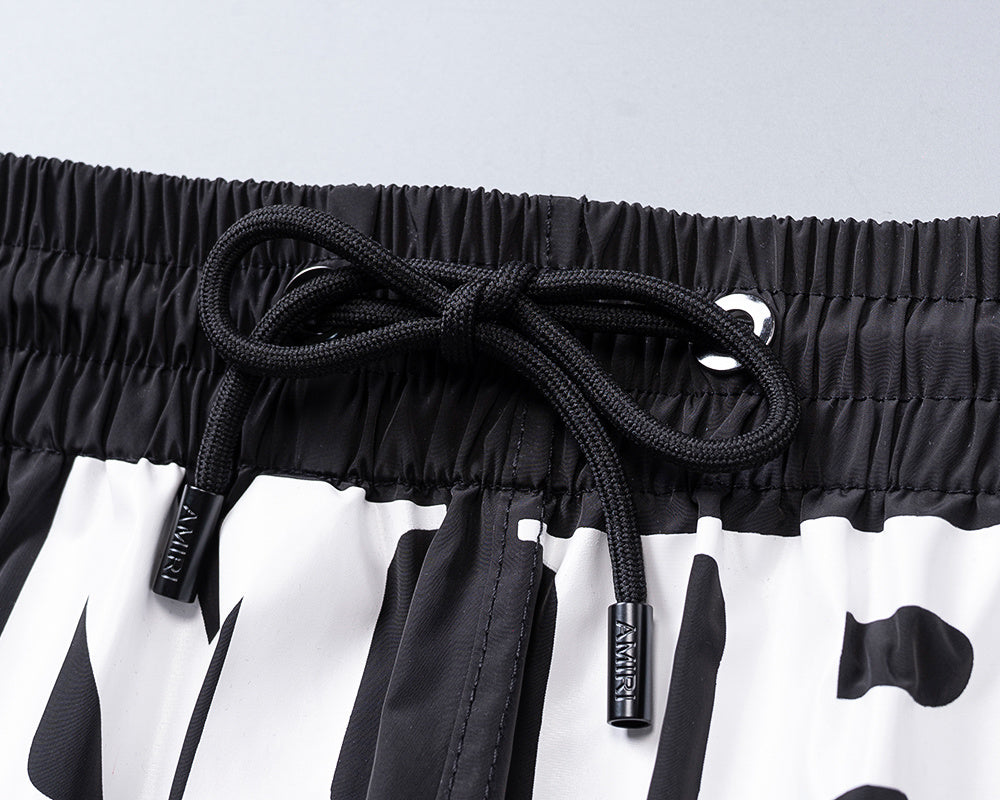 AMIRI-LOGO-STAR-SHORT
